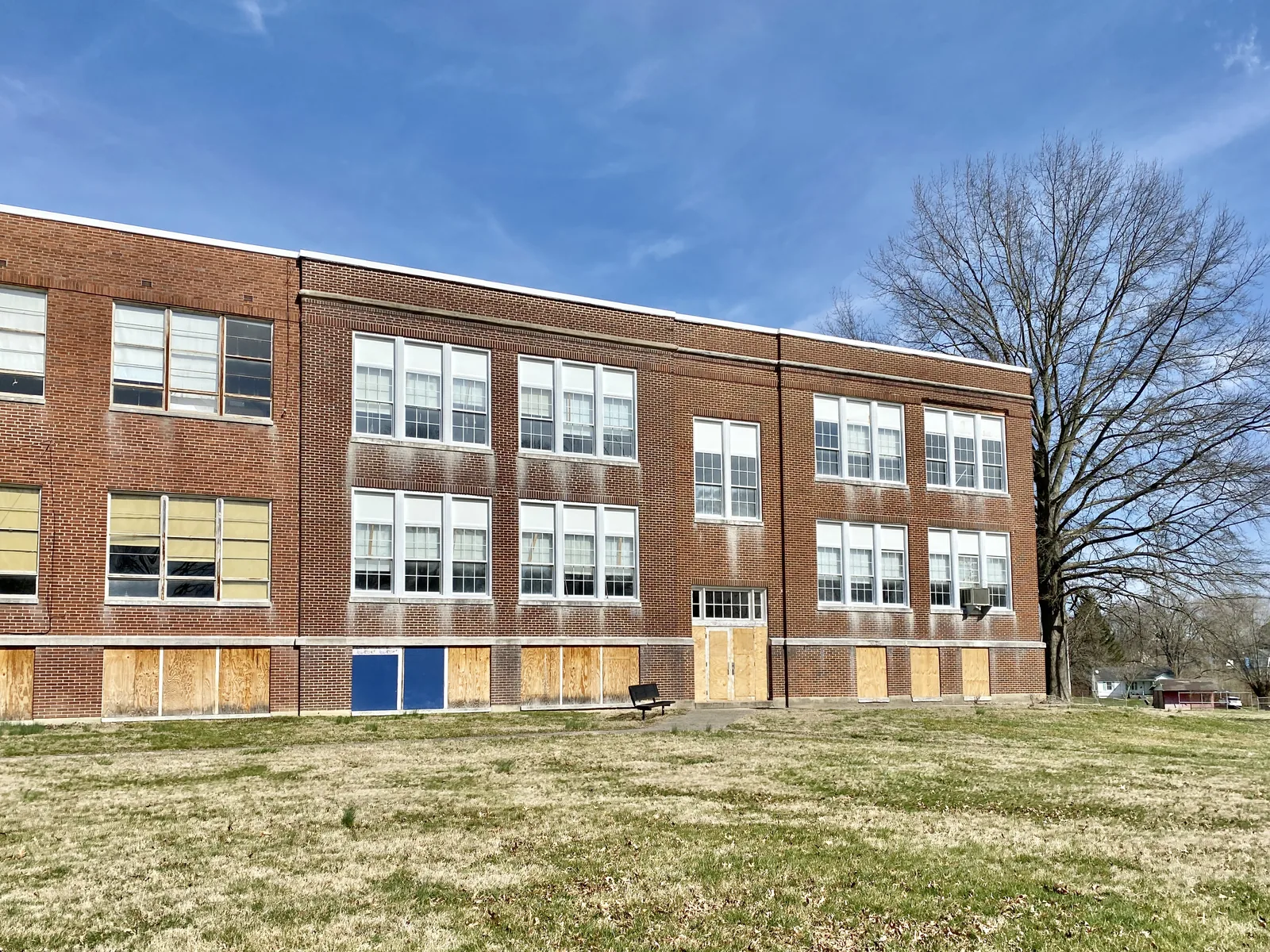 Built circa 1925 and expanded with an addition in the 1950s, this Classical Revival-style building was constructed to serve as a public school for Falmouth, Kentucky, replacing a previous school built in 1883.  The building is clad in red brick with replacement windows, limestone trim, a front door with a trim surround and doric pilasters, and a red brick addition at the southwest corner of the building with aluminum windows.  The building ceased to be utilized as a high school in 1968 when Pend