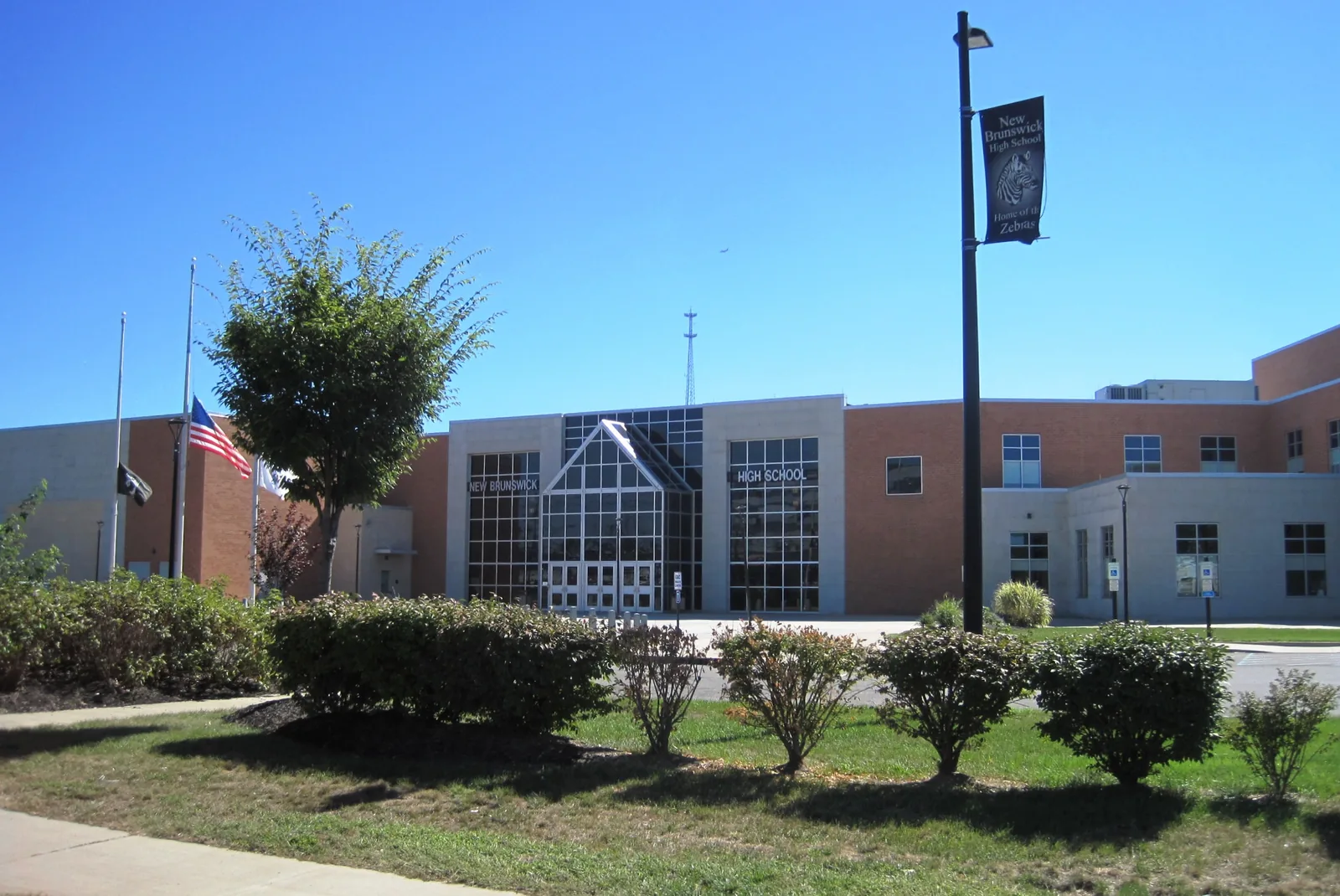 Photo showing the front of New Brunswick High School in New Brunswick, New Jersey. Photo taken from Somerset Street (New Jersey Route 27).