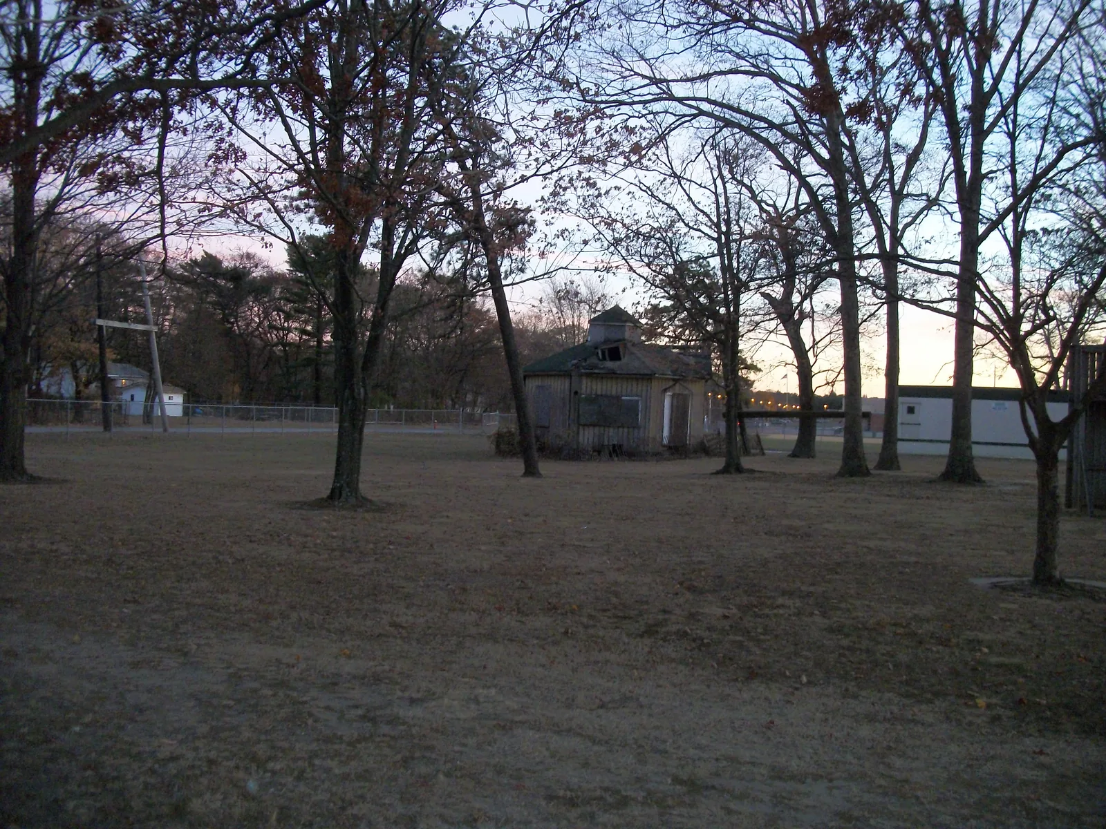The historic Modern Times School, in Brentwood, New York, as shot from over the chain-link fence surrounding Brentwood High School.