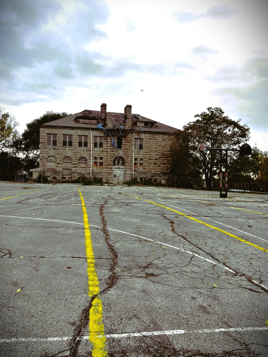 Franklin Elementary School in Kansas City, KS, is a historic building located in the East Argentine neighborhood that closed as a school in 1972. The Romanesque Revival-style limestone building, constructed in 1898, is now a community center and was listed on the National Register of Historic Places in 2013. After a fire damaged the building in 2023, the center remains closed but is currently undergoing rehabilitation plans.