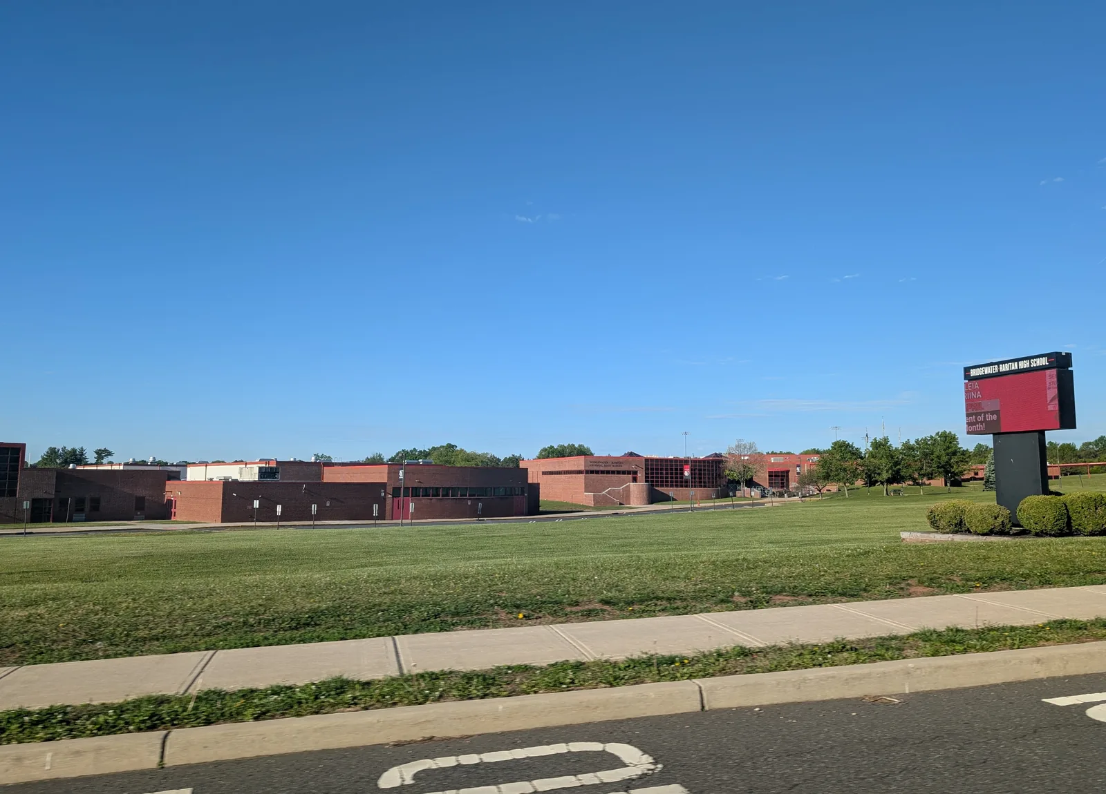 Photo of the front of Bridgewater-Raritan High School in Bridgewater Township, New Jersey. Photo taken from Garretson Road looking southwest.