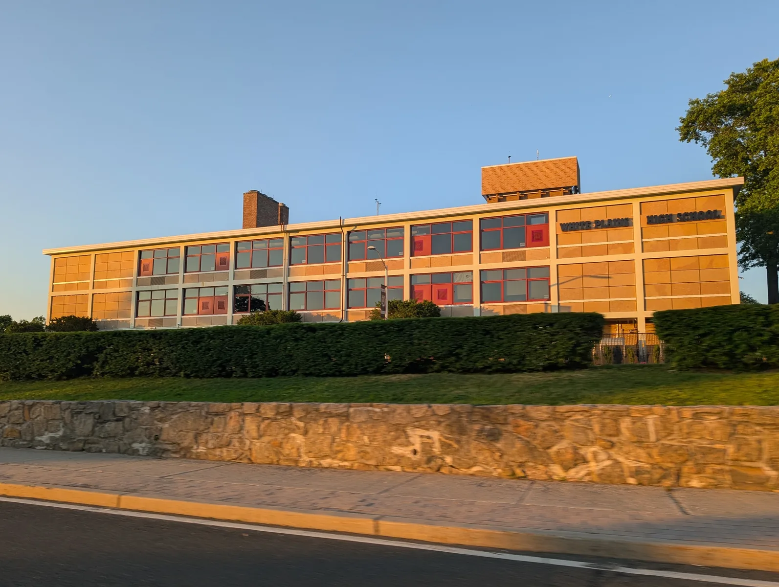Photo of the northwestern wing of White Plains High School in White Plains, New York. Photo taken from New York State Route 127 (North Street) looking east-northeast.
